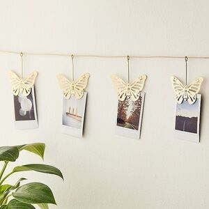 urban outfitters butterfly photo clip banner